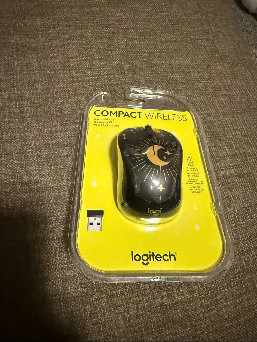 Logitech Wireless Mouse Packaging - Yellow and Clear